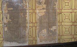 Harvard House Stratford-upon-Avon. Remains of a wall painting on 2 plaster panels, probably from the late 16th century and currently undergoing conservation. Adjacent walls have been painted to show the original appearance.